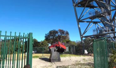 Trying To Split A Car In Half By Dropping It From 150-Feet Onto A Giant Axe Blade