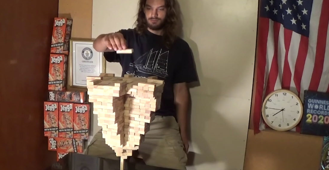 Man Sets New World Record By Stacking 485 Jenga Blocks On A Single Vertical Piece
