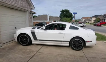 Learn How To Drive!: Kid Sitting In Driver’s Seat Crashes Car Into Garage Door
