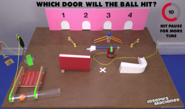 What Door Will The Ball Hit?: A Rube Goldberg Machine Guessing Game
