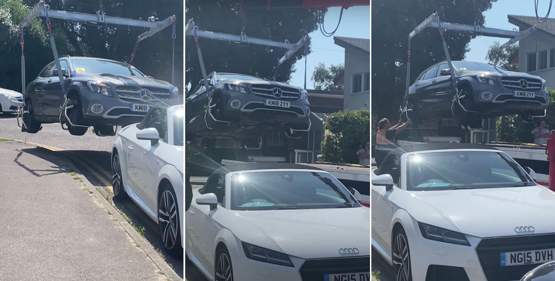 Tow Truck Crane Lifts Illegally Parked Car