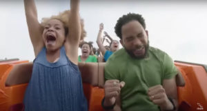 Behind-The-Scenes Footage Of Commercial Actor Struggling On Roller Coaster