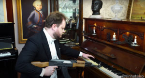 Pianist Performs Soviet Anthem With AK-47