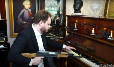 Pianist Performs Soviet Anthem With AK-47