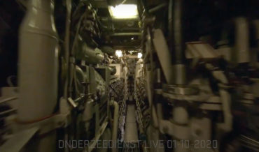Drone Pilot Maneuvers His Copter Through The Cramped Quarters Of A Submarine