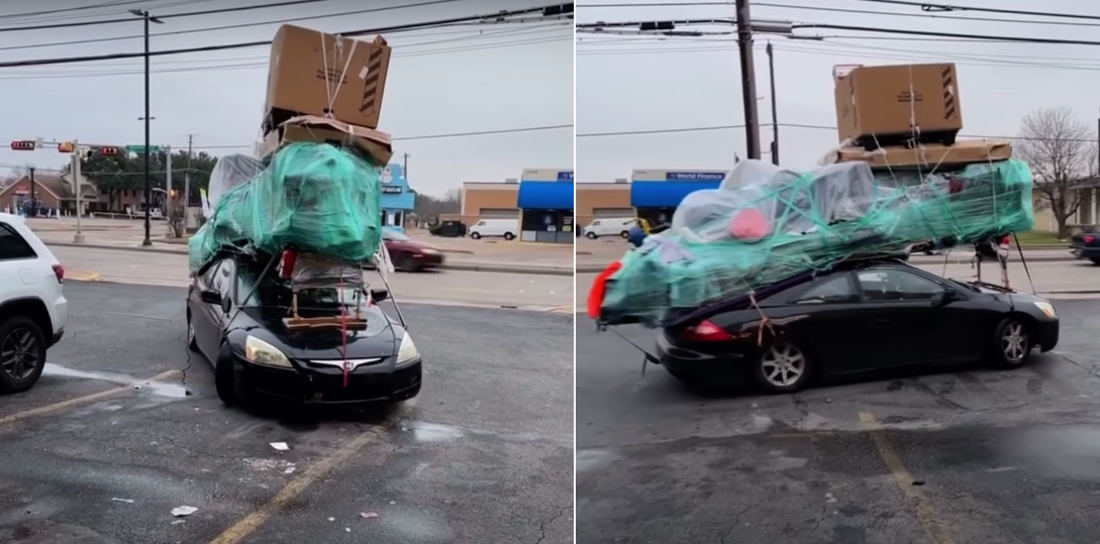 Car Loaded With Rooftop Of Stuff Bigger Than The Car Is