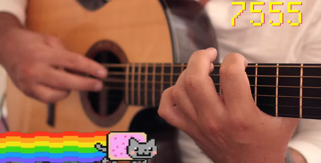 Fingers Of Fury: Guitarist Performs 10,000 Harmonics In 14-Minutes