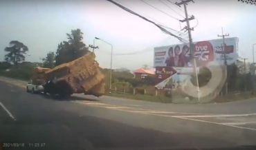 Womp Womp: Truck Overloaded With Hay Takes Turn Too Fast