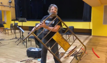 What The?: Man Plays Metal Street Barricade Like A Flute