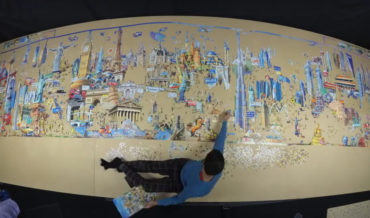Timelapse Of Man Assembling A Giant 42,000-Piece Puzzle Of World Landmarks