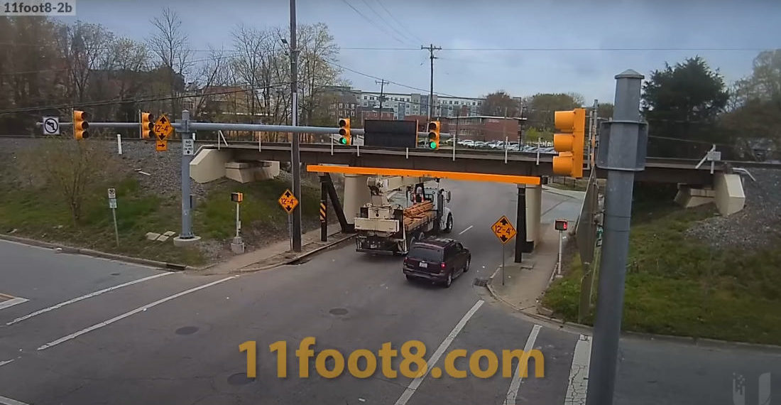 Can Opener Bridge Just Barely Claims A Crane Truck