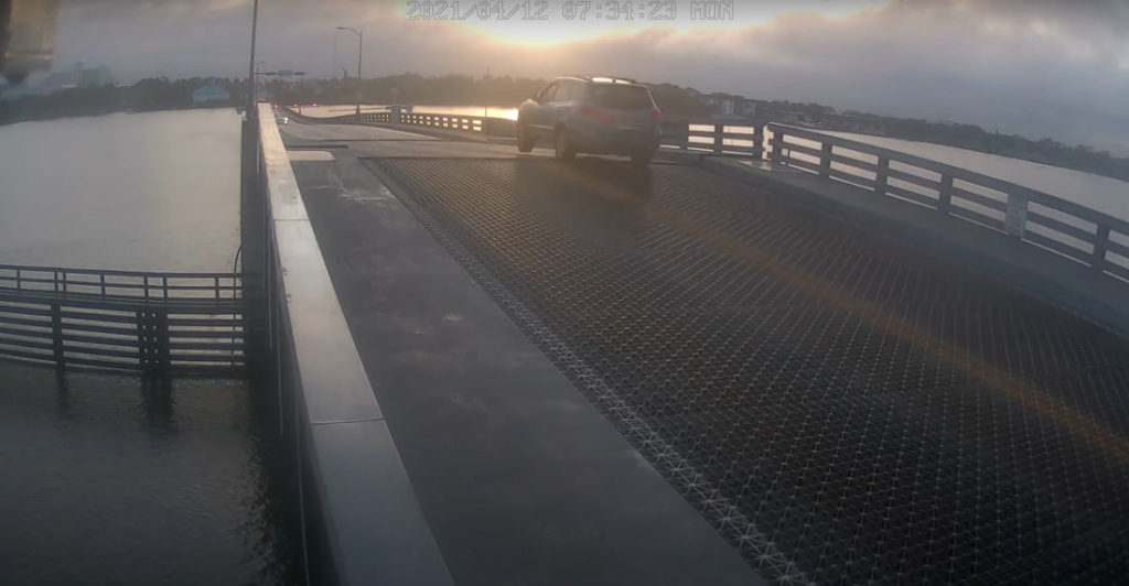 Motorist Drives Through Warning Gate, Casually Jumps Opening Drawbridge ...
