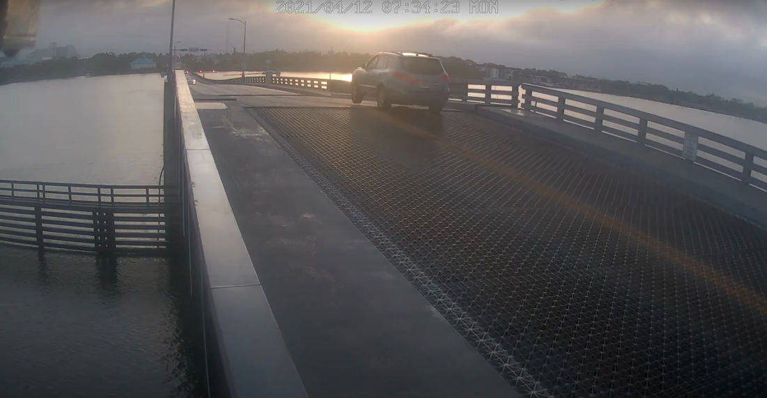 Motorist Drives Through Warning Gate, Casually Jumps Opening Drawbridge