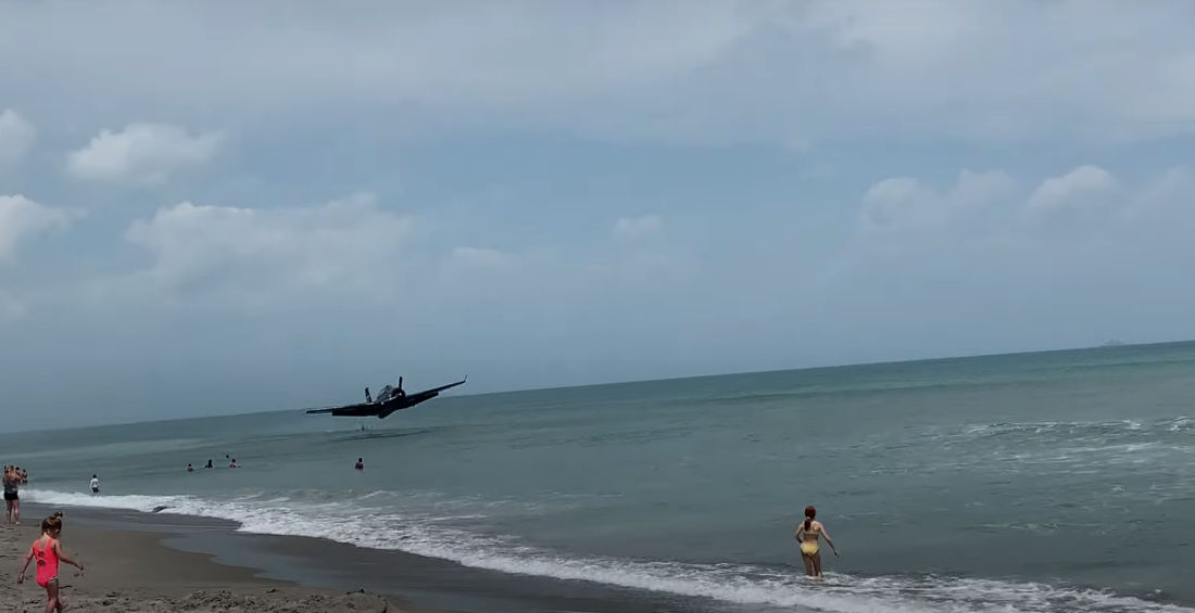 Coming In Hot!: WW2 Plane Lands In Ocean Right In Front Of Beachgoers After Engine Failure
