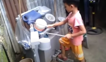 Kid Covers Guns N’ Roses On Homemade Bucket And Jug Drum Set