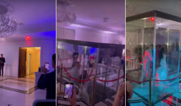 Bride And Groom Appear At Reception Through Glass Elevator In Floor