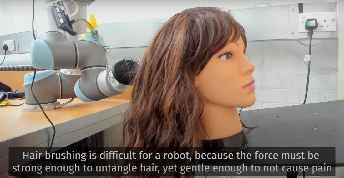 Teaching A Robot To Brush Tangled Human Hair Without Causing Pain