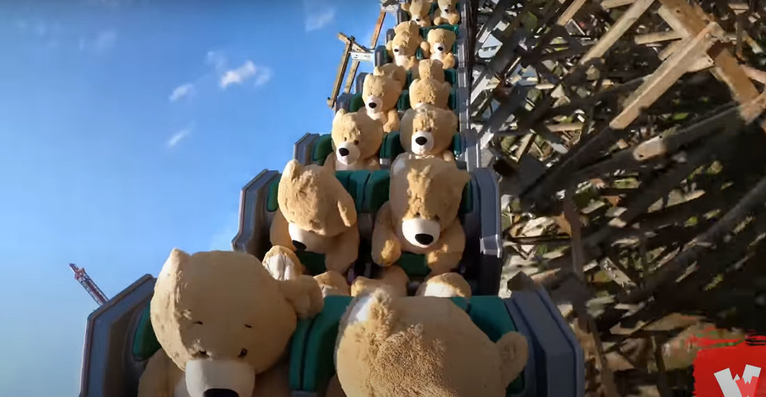 Watching A Roller Coaster Filled With Giant Stuffed Teddy Bears