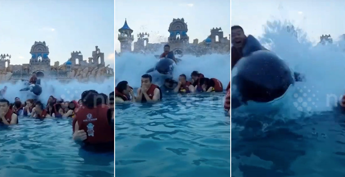 Man Riding Inflatable Orca Surfs Over Other Swimmers In Wave Pool