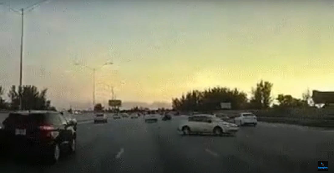 Car Makes Surprise Overly Dramatic Lane Change On Highway