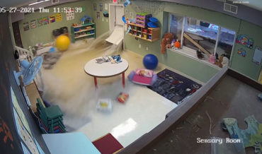 Security Cam Captures The Moment A Pre-School’s Door Gives Way To Flood