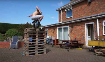 Unicyclist Makes Incredible 10-Pallet High Jump