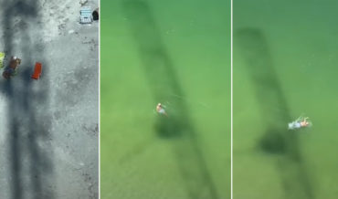 Crane Operator Moves Crane To Constantly Keep Beachgoer In Shadow