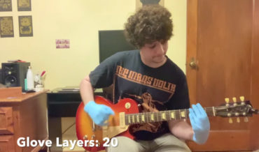 Playing Metallica’s ‘Enter Sandman’ Wearing More And More Layers Of Latex Gloves