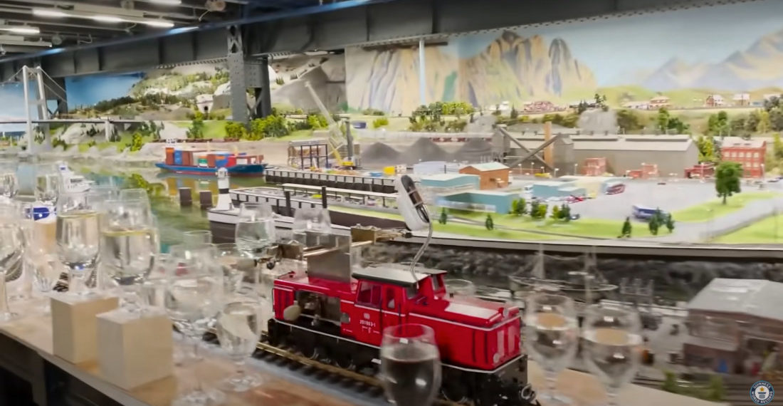 World Record For Longest Melody Performed By A Model Train Tapping Wine Glasses