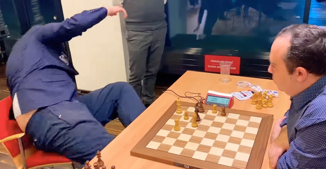 Polish National Chess Champion Falls Out Of Chair After Loss