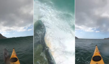 POV Video Of Kayaker Perfectly Dodging Wave With A Barrel Roll