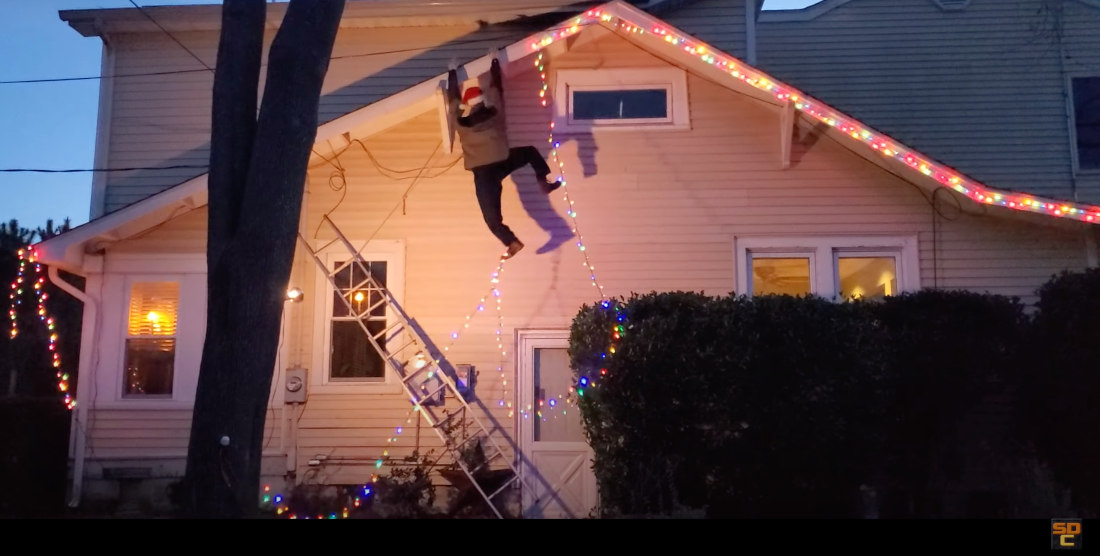 Clever Animated Man Dangling From Gutter Christmas Decoration ...