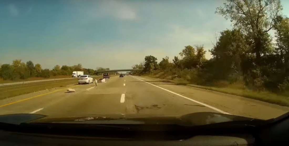 Surprise!: Truck Drops Sofa On Highway