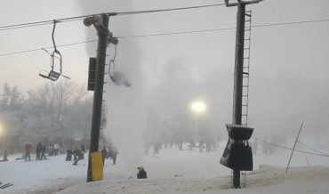 Skier’s Chairlift Gets Stopped Directly Over Broken Water Pipe: Having A Bad Day?