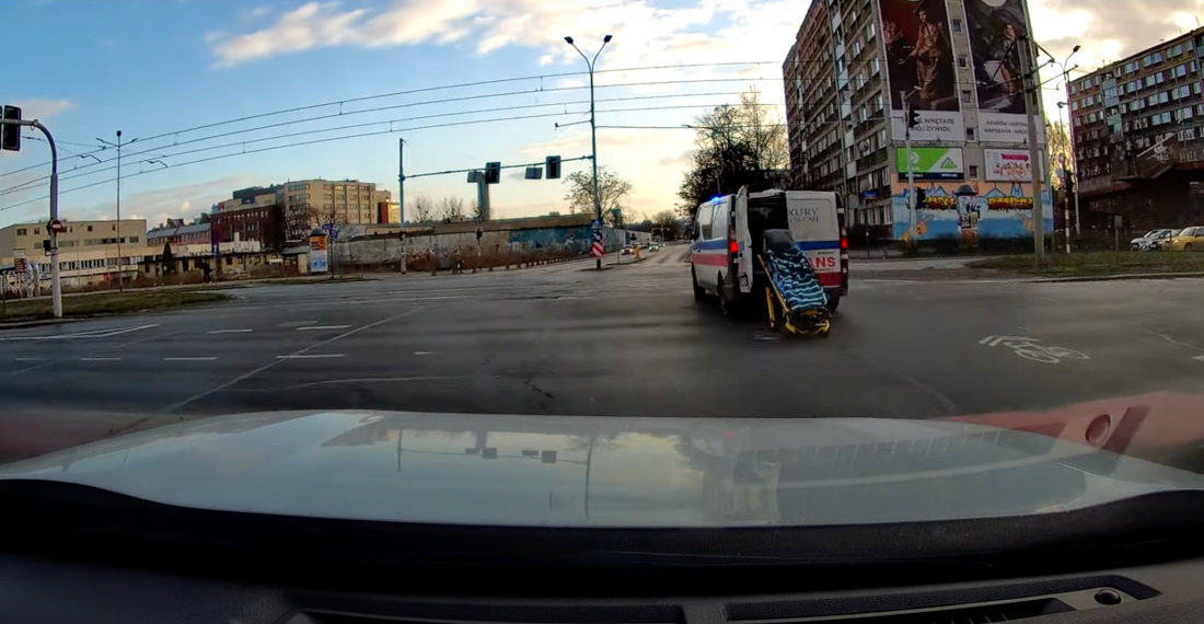 Ambulance Forgets To Shut Back Door, Gurney Rolls Out Into Intersection