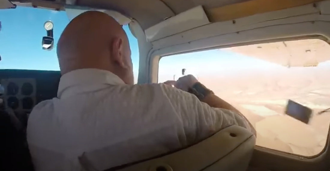 Man Opens Plane Window To Take Photo: Camera Gets Sucked Out