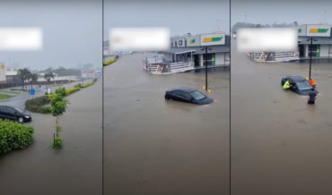 Driver Pulls Into Flooded Parking Lot, Proceeds To Float