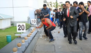 World Record Video Of Most Coconuts Smashed By Hand In One Minute
