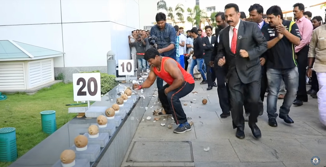 World Record Video Of Most Coconuts Smashed By Hand In One Minute