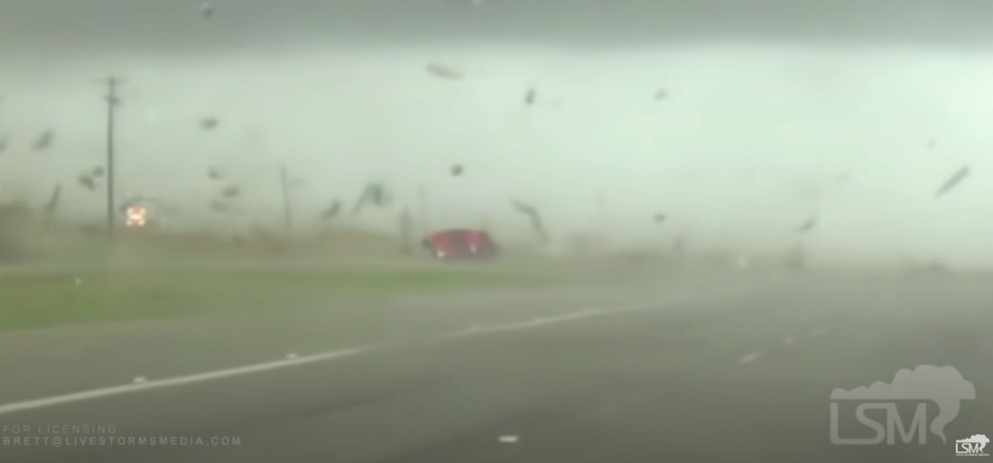 Tornado Knocks Truck On Its Side, Spins It Around, Rights It, Motorist Drives Away