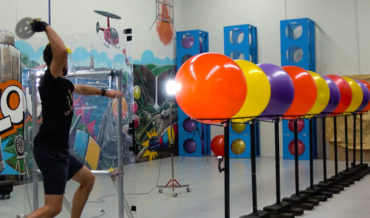 Attempting To Pop 10 Exercise Balls In A Row With Different Weapons