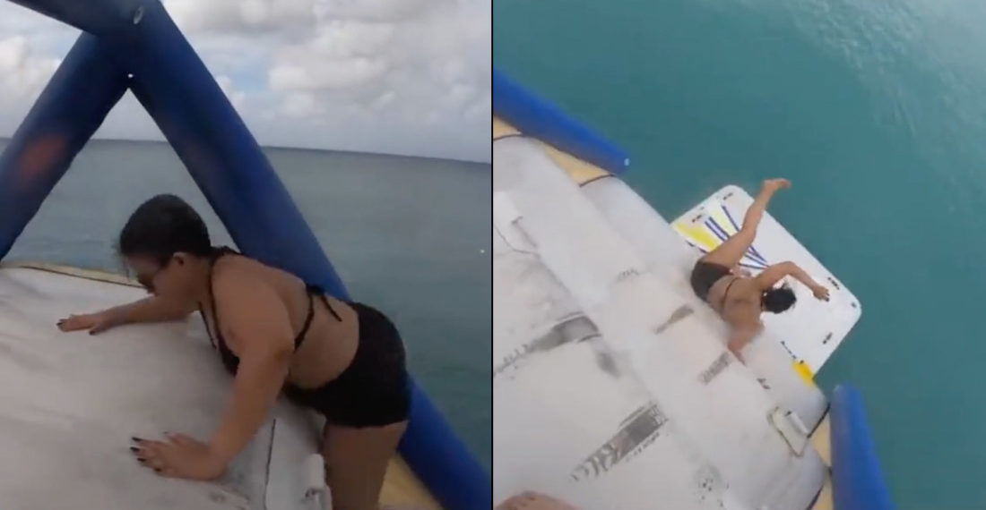 Woman Takes Tumble Down Inflatable Slide Climb