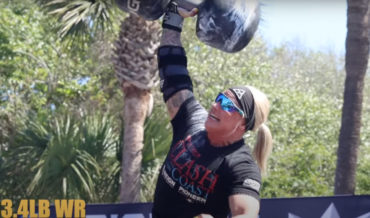 Woman Performs 183.4LB Circus Dumbbell Lift To Set New World Record