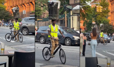 Street Performer Rides Bike While Balancing Full Trash Can On Head
