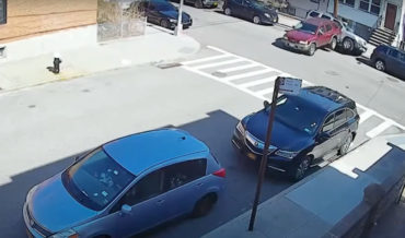 Nailed It: SUV Reverses Hard Into Parked Car