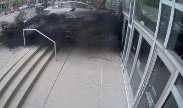 Security Cam Footage Of Tesla Crashing Into Building At 70MPH