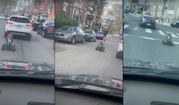 R/C Chucky On 4-Wheeler Cruising In Traffic