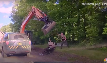 Man Attempts To Prevent Son’s Arrest By Swinging Excavator Bucket At Police