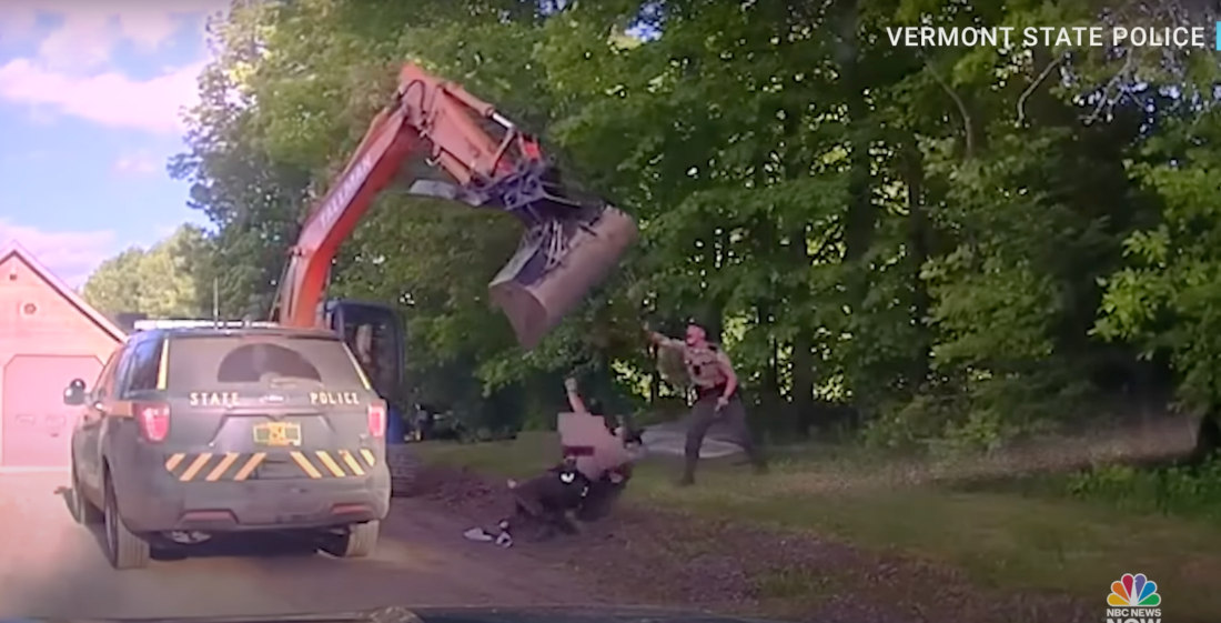 Man Attempts To Prevent Son’s Arrest By Swinging Excavator Bucket At Police