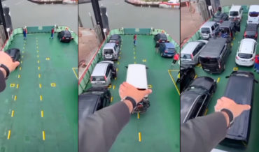 Giant Man Appears To Move Cars Onto Ferry By Hand